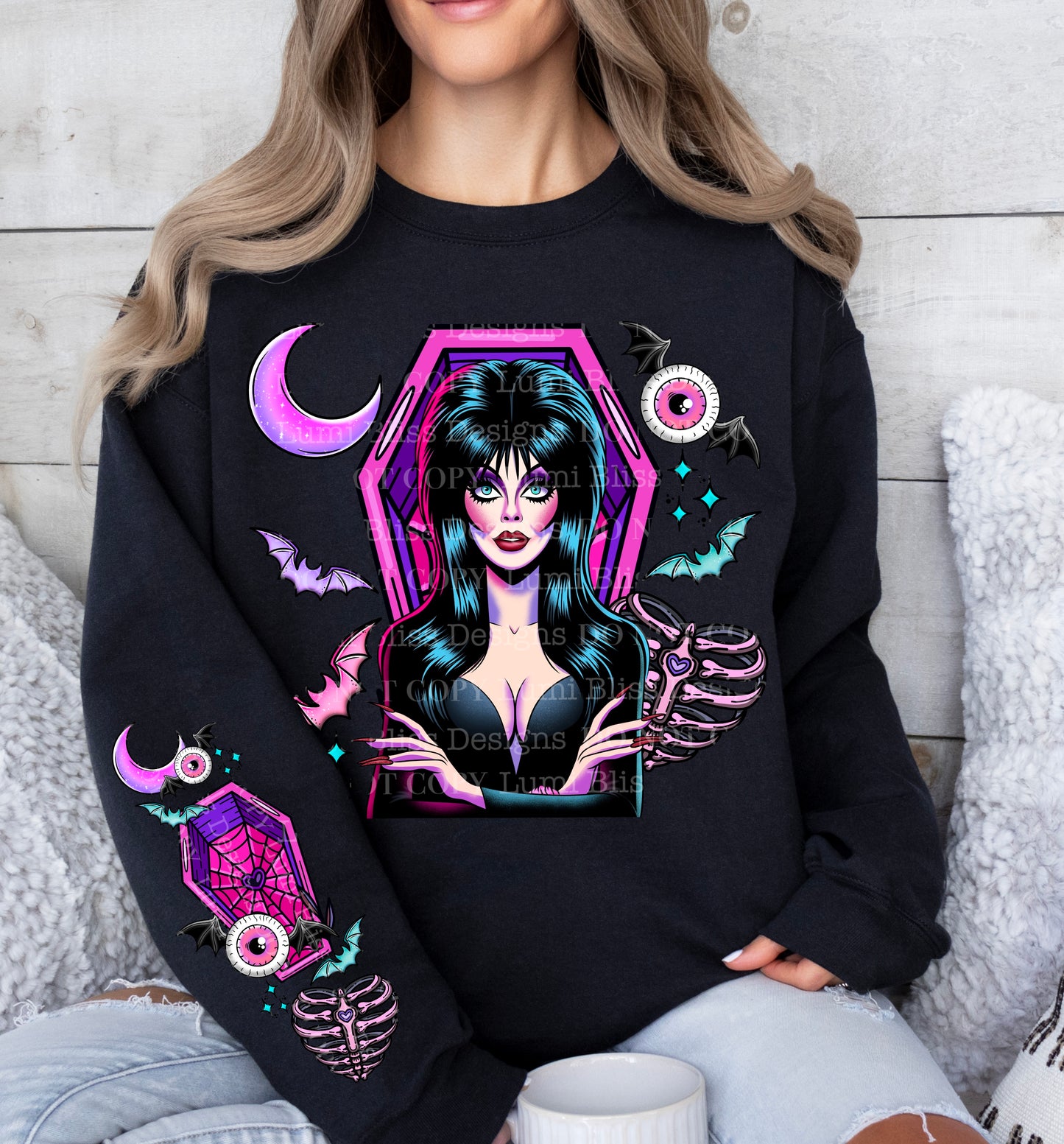 Elvira w/sleeves/spine